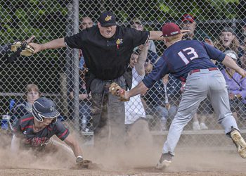 Independence’s Michael McKinney, left, slides in safely to home as Bluefield pitcher Gavin Lail is late with the tag during Thursday action in Coal City. (F. Brian Ferguson/Lootpress)