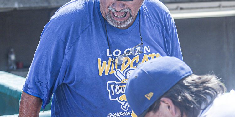 Logan Head Coach Kevin Gertz reacts after an attempt to pour a cooler of water over his head during his team’s victory celebration. (F. Brian Ferguson/Lootpress)