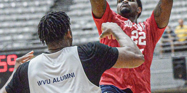 Southern WV Elite’s Devin Ebanks puts up a jumper against Best Virginia's Sagaba Konate during an exhibition game in Beckley on July 7. (F. Brian Ferguson/Lootpress)
