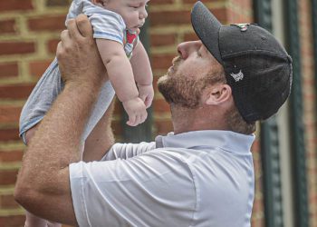 Sutton David Jude, left, has a face-to-face with his father Davey Jude, after Davey won the Mountain State Golf Classic on Monday at Glade Springs. (F. Brian Ferguson/Lootpress)
