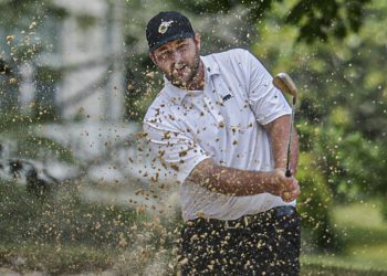 Davey Jude chips out of the sand en route to his Mountain State Golf Classic win on Monday at Glade Springs (F. Brian Ferguson/Lootpress)