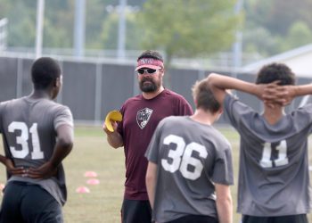 (Brad Davis/For LootPress) Woodrow Wilson head coach Steve Laraba talks with his players at the start of practice Monday afternoon at the YMCA Paul Cline Memorial Soccer Complex.