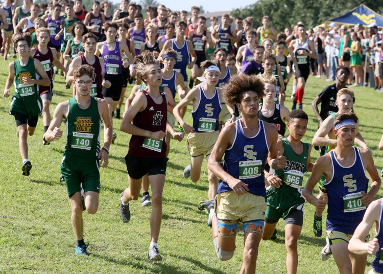 (Brad Davis/For LootPress) Runners from various schools take off from the start of the high school boys portion of the Chic-Fil-A Invitational Saturday morning at Beckley-Stratton Middle School.