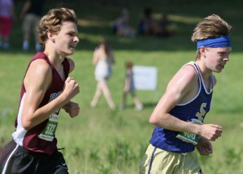 (Brad Davis/For LootPress) Shady Spring's Jacob Dowdy, right, and Woodrow Wilson's Aiden Kneeland stay locked together as they run in 1st and 2nd place during the duration of the high school boys portion of the Chick-Fil-A Invitational Aug.28 at Beckley-Stratton Middle School.