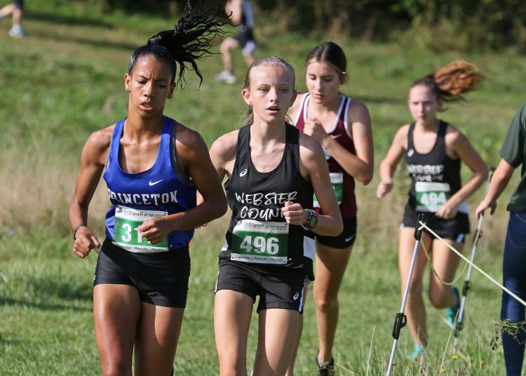 (Brad Davis/For LootPress) Princeton's Asia Collins, left, and Braxton County's Alexis White compete in the Chic-Fil-A Invitational Saturday morning at Beckley-Stratton Middle School.