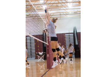Beckley's Olivia Ziolkowski goes up for the block at the net during a practice at Woodrow Wilson High School. (Heather Belcher/Lootpress)