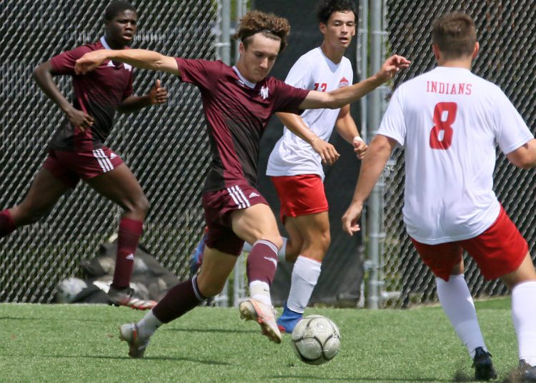 (Brad Davis/For LootPress) Woodrow Wilson's Carson Eckley receives a pass as he's converged on by Bridgeport defender Brody Nolte (#8) Sept. 4 at the YMCA Paul Cline Memorial Sports Complex.
