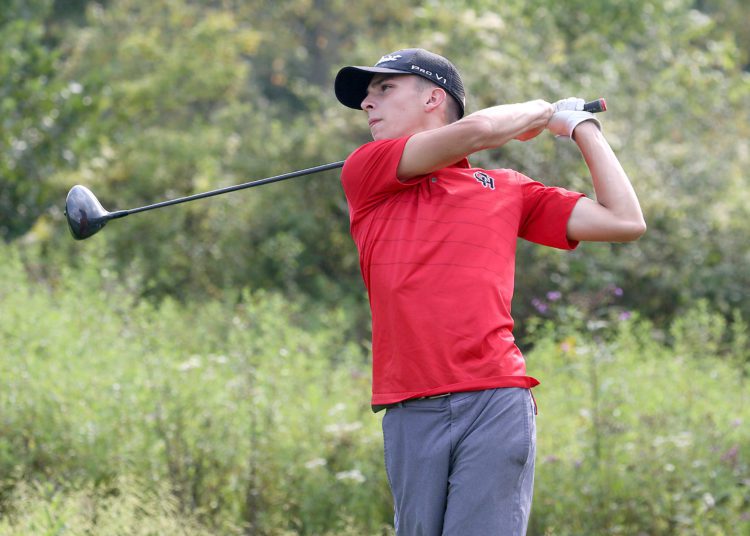 (Brad Davis/For LootPress) Oak Hill's Jack Hayes tees off during a high school golf event at Bridge Haven Golf Club Wednesday afternoon.