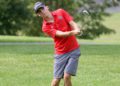 (Brad Davis/For LootPress) Oak Hill's Jack Hayes chips onto a green during a high school golf event at Bridge Haven Golf Club Wednesday afternoon.