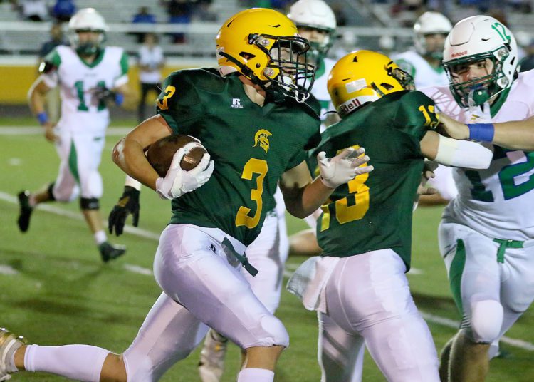 (Brad Davis/For LootPress) Greenbrier East's Bryson Ormsbee carries the ball against Robert C. Byrd Friday night in Fairlea.