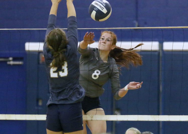 (Brad Davis/For LootPress) Independence's Kyra Davis attacks as Nicholas County's Mason Stone tries to block during a tri-match that included Liberty Wednesday night in Coal City.