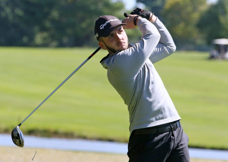 (Brad Davis/For LootPress) Wyoming East's Jacob Cochran tees off during the Class AA, Region 3 Tournament Monday afternoon at Grandview.