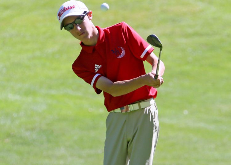 (Brad Davis/For LootPress) Herbert Hoover's Max Bowen chips onto a green during the Class AA, Region 3 Tournament Monday afternoon at Grandview.