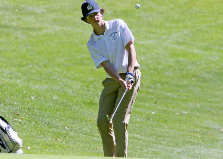 (Brad Davis/For LootPress) Shady Spring's Zach Smith chips onto a green during the Class AA, Region 3 Tournament Monday afternoon at Grandview.