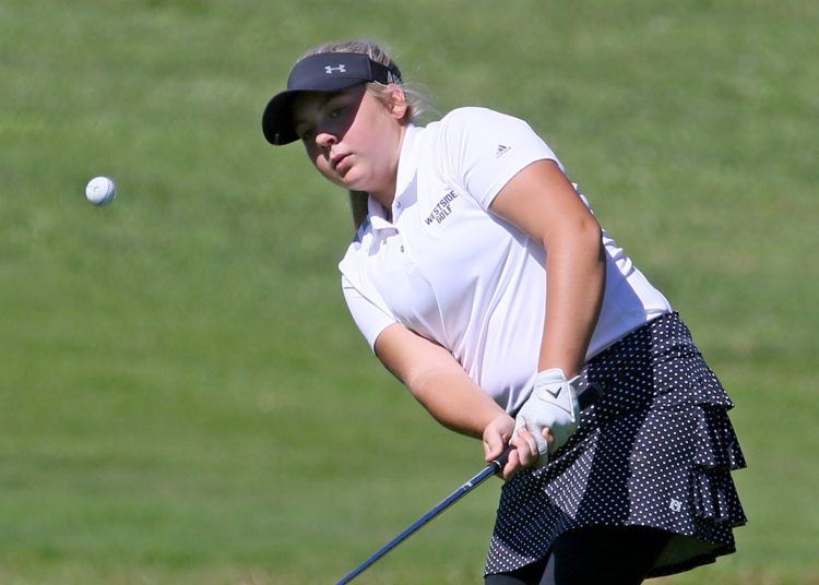 (Brad Davis/For LootPress) Westside's Kerri-Anne Cook chips onto a green during the Class AA, Region 3 Tournament at Grandview.