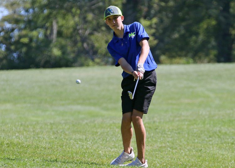 (Brad Davis/For LootPress) Nicholas County's Maddox Smallwood chips onto a green during the Class AA, Region 3 Tournament Monday afternoon at Grandview.