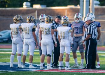Shady Spring and Independence captains meet at midfield prior to their game earlier this season in Coal City. (Heather Belcher/Lootpress)