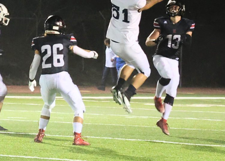File Photo - Liberty's Logan Dodrill goes up to catch the ball against Logan on Sept. 17 at Glen Daniel. (Renee Richardson/For Lootpress)