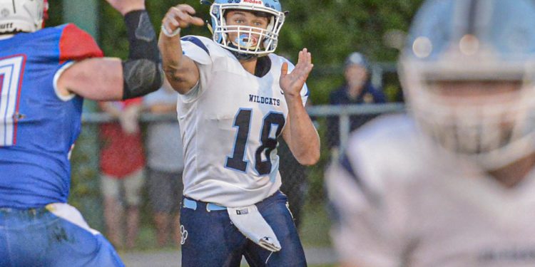 Meadow Bridge QB Dustin Adkins throws a pass against Midland Trail during a game on Sept. 10 in Hico. (F. Brian Ferguson/Lootpress).