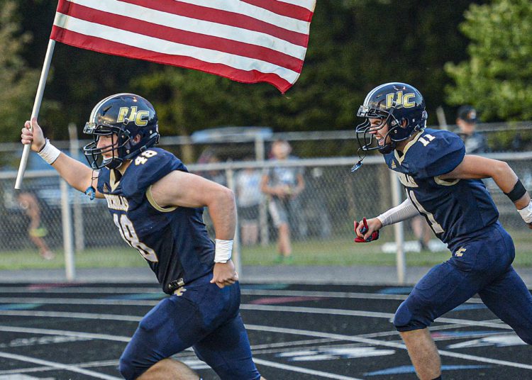 Nicholas County charges onto the field for their first home game of the season on Sept. 16 (F. Brian Ferguson/Lootpress).