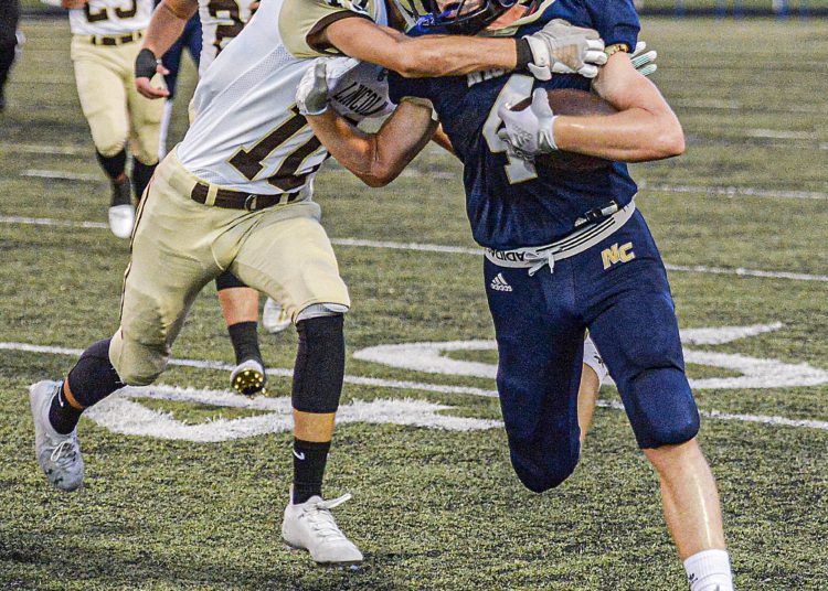 Nicholas County’s Alex Pritt picks up yards against Lincoln during Thursday action in Summersville. (F. Brian Ferguson/Lootpress).