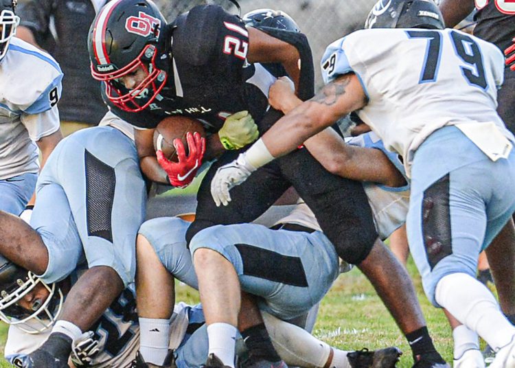 Oak Hill’s Ethan-Vargo Thomas picks up yards against Lincoln County during Friday action in Oak Hill. (F. Brian Ferguson/Lootpress).