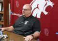Concord football coach Dave Walker talks during his media availability in August.