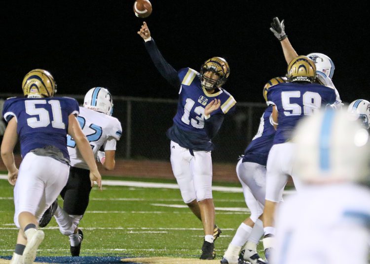 (Brad Davis/For LootPress) Shady Spring quarterback Cameron Manns throws a pass against Mingo Central Friday night at Shady.