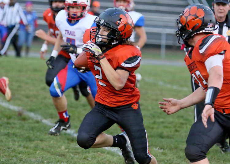 (Brad Davis/For LootPress) Summers County's Drake Cole gets loose for a huge gain up the sideline against Midland Trail Monday night in Hinton.