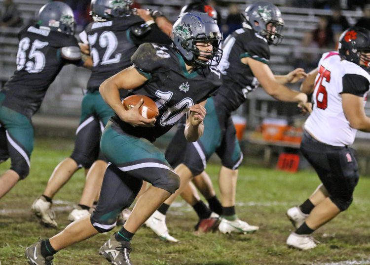 (Brad Davis/For LootPress) Wyoming East's Chandler Johnson carries the ball against PikeView Friday night in New Richmond.