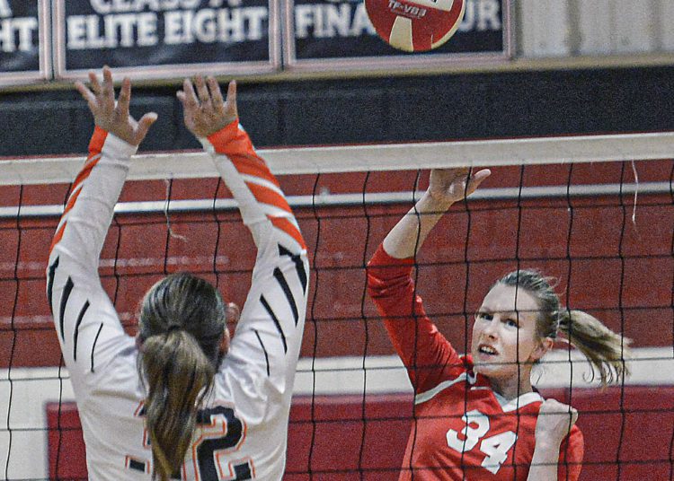 Greater Beckley Christian’s Katerina Lowe, right, hits a net shot as Summers County’s Danielle Midkiff defends during Thursday action in Beckley. (F. Brian Ferguson/Lootpress).