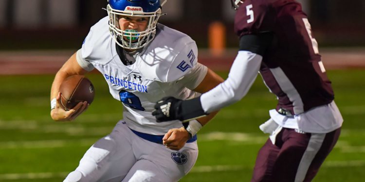 Princeton's Grant Cochran tries to evade a tackle during a game against Beckley on Oct. 1 (Greg Barnett)