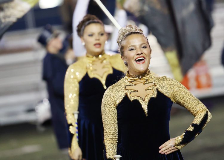 Nicholas County color guard members perform during their football game against James Monroe in Summersville on Friday, Oct. 29, 2021 (Photo by Chris Jackson)
