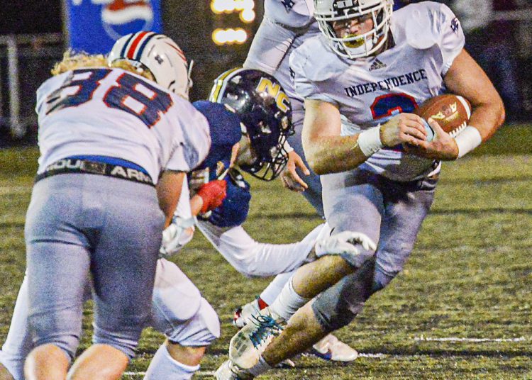 Independence’s Atticus Goodson picks up ground yards against Nicholas County during Friday action in Summersville. (F. Brian Ferguson/Lootpress).