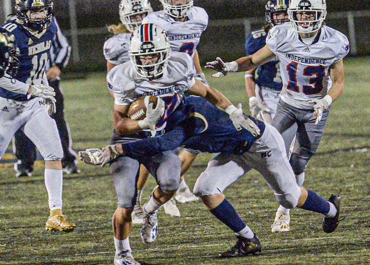 Independence’s Judah Price picks up big yards against Nicholas County during Friday action in Summersville. (F. Brian Ferguson/Lootpress).