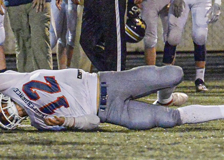Independence QB Logan Phalin stretches for a first down against Nicholas County during Friday action in Summersville. (F. Brian Ferguson/Lootpress).