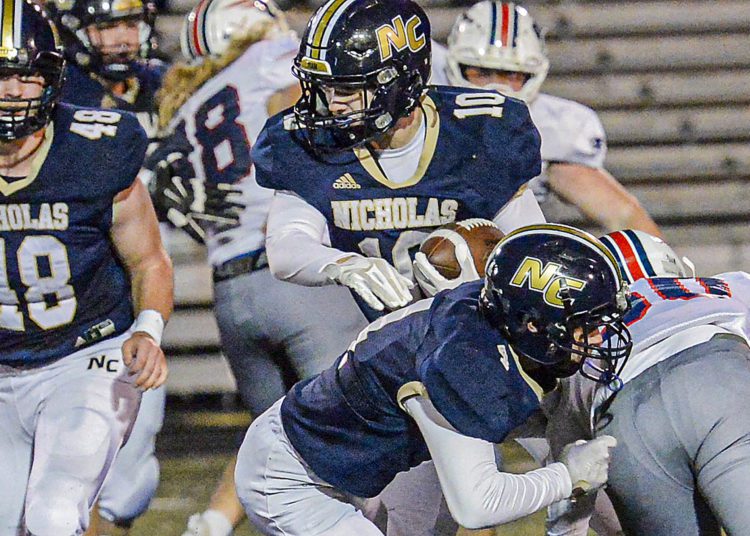 Nicholas County’s Kaleb Clark picks up yards against Independence during Friday action in Summersville. (F. Brian Ferguson/Lootpress).