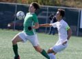 (Brad Davis/For LootPress) Charleston Catholic's Angelo Cinco battles for possession with Fairmont Senior's Bubby Towns during State Soccer Tournament action Friday morning in Beckley.