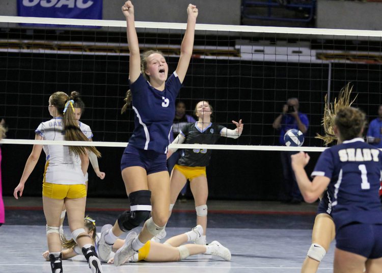(Brad Davis/For LootPress) Shady Spring's Meg Williams and teammates react after defeating during semifinal action at the State High School Volleyball Tournament Friday night at the Charleston Civic Center.