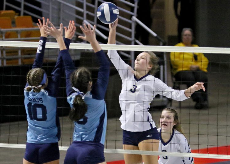 (Brad Davis/For LootPress) Shady Spring's Meg Williams attacks as Philip Barbour's Averi Carpenter, left, and Alyssa Hill defend during the Class AA Championship match Saturday morning at the Charleston Civic Center.