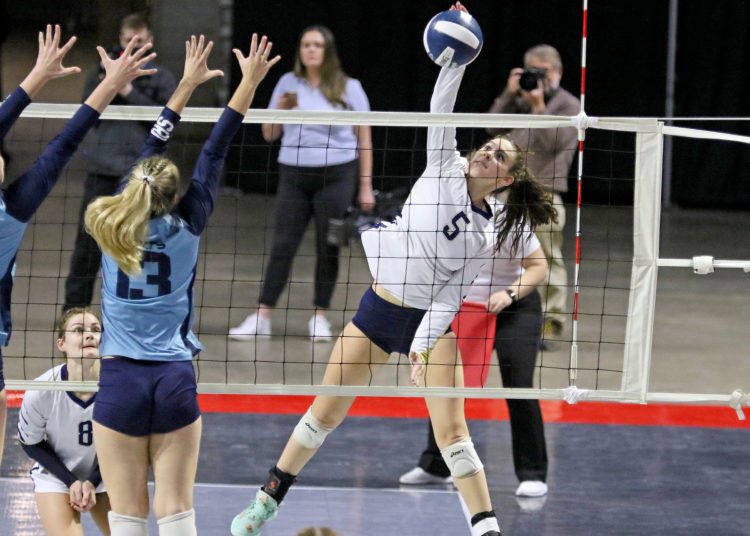 (Brad Davis/For LootPress) Shady Spring's Chloe Thompson attacks as Philip Barbour's Avery McDaniel (#13) defends during the Class AA Championship match Saturday morning at the Charleston Civic Center.