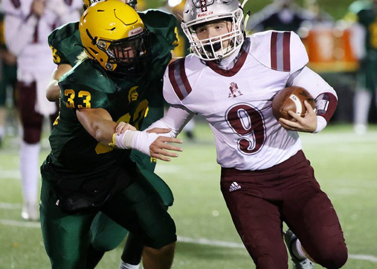 Greenbrier East’s Jarrett McHale (33) tackles George Washington’s Hasten Pinkerton (9) dint  their high school football game in Fairlea on Friday, Nov. 12, 2021 (Photo by Chris Jackson)