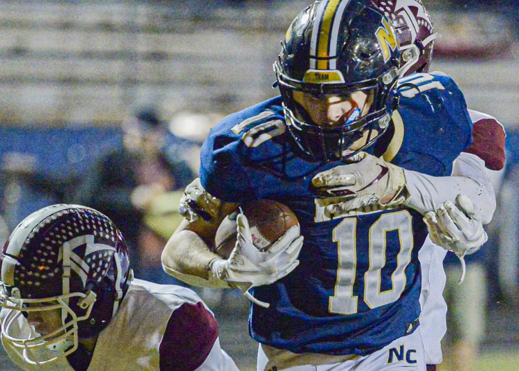 Nicholas County’s Kaleb Clark tears his way into the end zone for the score against Roane County during Friday action in Summersville. (F. Brian Ferguson/Lootpress)