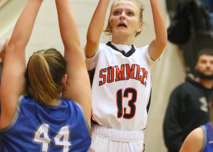 (Brad Davis/For The LootPress) Summers County's Sullivan Pivont shoots as Montcalm's Summer Williams defends during Friday action at the Rogers Oil Classic in Hinton.