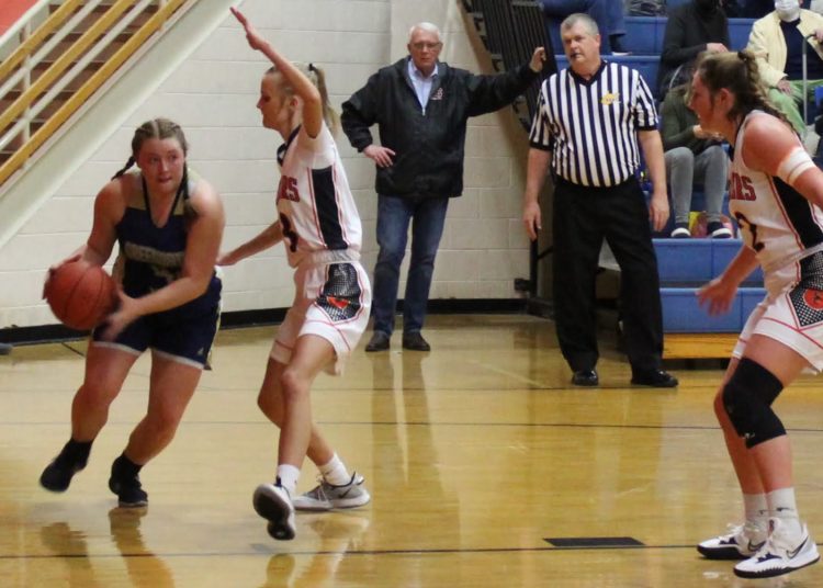 Summers County's Sullivan Pivont traps a Greenbrier West player during a game in Hinton Dec. 7 (Steph Redden)