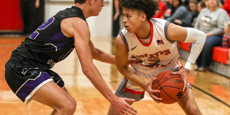 James Monroe's Eli Allen guards Greater Beckley's Kaden Smallwood during a game on Dec. 14 (File Photo Karen Akers)
