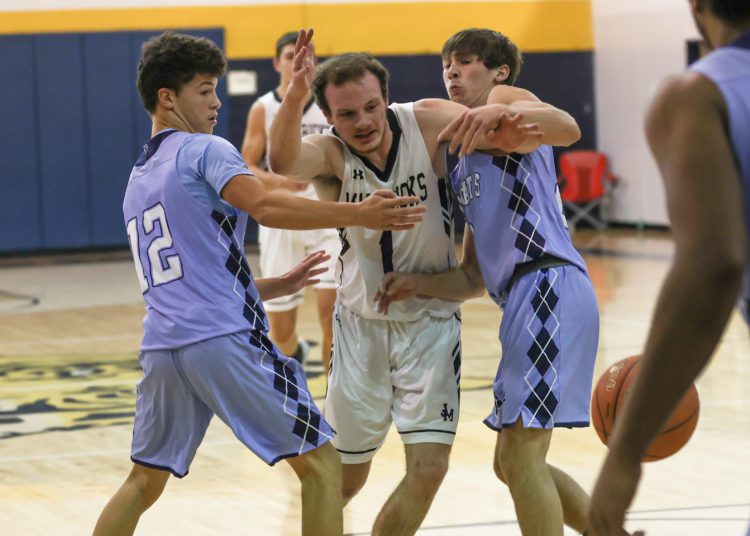 James Monroe's Shad Sauvage splits a double team during a scrimmage at Shady Spring on Dec. 5. (Karen Akers)