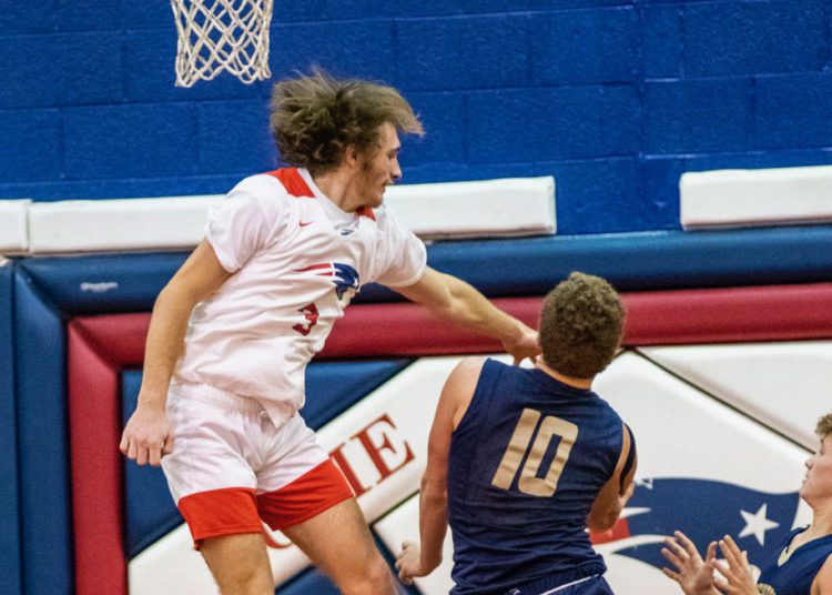 Independence's Cyrus Goodson defends a shot in the lane during. game against Greenbrier West on Dec. 23 in Coal City 

(File Photo/Heather Belcher)