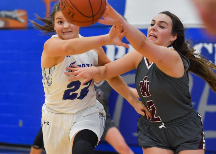 Princeton's Sadie Boggess fights for the ball during a game against George Washington on Dec. 3 (Greg Barnett/Lootpress)