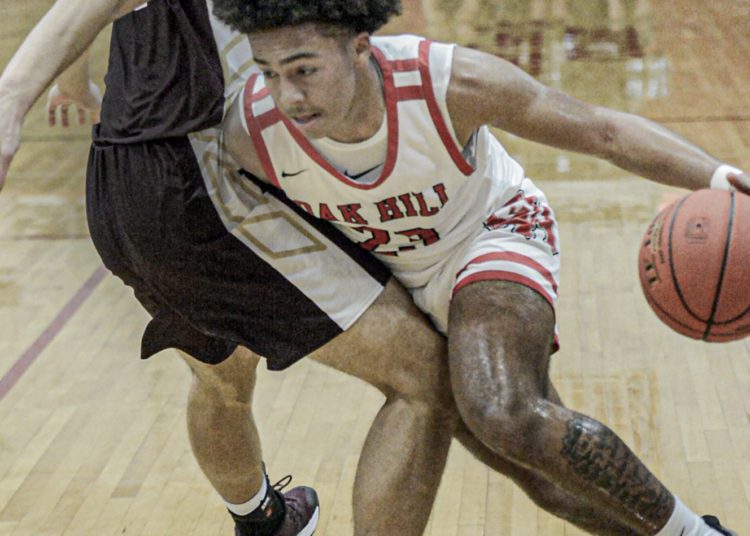 Oak Hill’s Ethan Vargo-Thomas drives against GW during Friday action in Oak Hill. (F. Brian Ferguson/Lootpress)